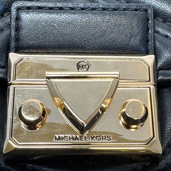 Michael Kors Serena MD Quilted Leather Flap Backpack in black. main image 8